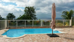 Appartement de 3 chambres avec vue sur la mer piscine partagee et jardin clos a Bouillante a 2 km de la plage
